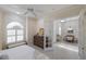 Serene bedroom boasts connecting doors to dining room for flexible living at 4334 Corso Venetia Blvd, Venice, FL 34293