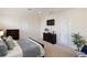 Bright and airy primary bedroom with neutral color palette and plantation shutters at 4334 Corso Venetia Blvd, Venice, FL 34293