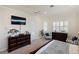 Spacious primary bedroom offers plenty of room with natural light and neutral colors at 4334 Corso Venetia Blvd, Venice, FL 34293