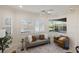 Cozy sitting room with plantation shutters, and comfortable seating at 4334 Corso Venetia Blvd, Venice, FL 34293