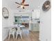 Open kitchen space overlooking dining area, offering stainless steel appliances and modern design at 720 Dalton Blvd, Port Charlotte, FL 33952