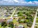 Attractive aerial image showcasing the property's layout and proximity to neighboring homes in the area at 976 Great Falls Nw Ter, Port Charlotte, FL 33948