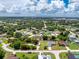 Overhead shot of the parcel emphasizing it's location amongst the surrounding homes in the neighborhood at 976 Great Falls Nw Ter, Port Charlotte, FL 33948