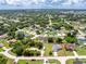 Aerial view highlighting property boundaries, neighboring homes, and RV parking at 976 Great Falls Nw Ter, Port Charlotte, FL 33948