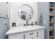 Stylish bathroom featuring a new vanity with a marble countertop, updated fixtures and attractive decor at 976 Great Falls Nw Ter, Port Charlotte, FL 33948