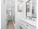 Bright bathroom showcasing a stylish vanity, mirror, walk-in shower, and a sleek, modern design at 976 Great Falls Nw Ter, Port Charlotte, FL 33948