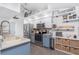 Kitchen with stainless appliances, overhead decor, and open shelving at 976 Great Falls Nw Ter, Port Charlotte, FL 33948