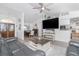 Open concept living room view showing the dining room and kitchen at 976 Great Falls Nw Ter, Port Charlotte, FL 33948