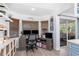 Bright office with wood blinds, desk, shelving, and convenient access to the outdoor area at 976 Great Falls Nw Ter, Port Charlotte, FL 33948