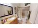 A bathroom vanity with granite countertops, and a shower and tub combination can be found in this home at 10214 Arrowhead Dr, Punta Gorda, FL 33955