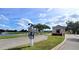 The Seminole Lakes community entrance includes a fountain, signage, and beautifully landscaped grounds at 10214 Arrowhead Dr, Punta Gorda, FL 33955