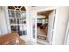 Open front door provides views to the foyer and living room with tile floors and high ceilings at 10214 Arrowhead Dr, Punta Gorda, FL 33955