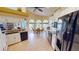 Open kitchen featuring stainless appliances, breakfast nook with large windows and lots of natural light at 10214 Arrowhead Dr, Punta Gorda, FL 33955