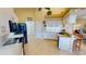 Bright kitchen features white cabinets, granite countertops, and stainless steel appliances at 10214 Arrowhead Dr, Punta Gorda, FL 33955