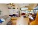 Spacious living room with high ceilings, tile floors, and large windows offering plenty of natural light at 10214 Arrowhead Dr, Punta Gorda, FL 33955