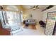 Comfortable living room with cozy seating, tile floors, and access to the foyer at 10214 Arrowhead Dr, Punta Gorda, FL 33955