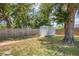 Large backyard with a well-maintained shed and a privacy fence, perfect for outdoor activities and storage at 1053 Yarmouth St, Port Charlotte, FL 33952