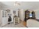 Cozy living area features tile flooring, ceiling fan, and seamless flow into adjacent spaces at 1053 Yarmouth St, Port Charlotte, FL 33952