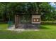 Backyard chicken coop providing a secure and functional space for raising chickens at 10810 Wheeler Pl, Punta Gorda, FL 33950