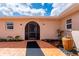 Charming courtyard with tiled flooring, decorative planter, and covered entrance at 10810 Wheeler Pl, Punta Gorda, FL 33950