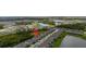 Aerial view displaying the neighborhood and community features, close to highways and shopping centers at 11105 Balfour E St, Venice, FL 34293