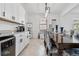 Bright dining room with luxury countertops and tile floors at 11105 Balfour E St, Venice, FL 34293