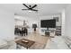 Open-concept living space with an eat-in kitchen, dining, and a cozy Gathering room with a ceiling fan at 11105 Balfour E St, Venice, FL 34293