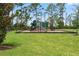 Community playground with slides and climbing equipment offers a fun and safe space for children at 11105 Balfour E St, Venice, FL 34293