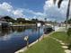 Scenic canal view showcasing private boat docks and residences at 1128 Rum Cay Ct, Punta Gorda, FL 33950