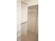 A custom-built closet with rods and shelving offering many storage options at 1128 Rum Cay Ct, Punta Gorda, FL 33950