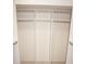 An organized walk-in closet system with rods and shelving at 1128 Rum Cay Ct, Punta Gorda, FL 33950
