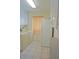 Laundry room equipped with washer, dryer, white cabinets, and a window bringing in natural light at 1128 Rum Cay Ct, Punta Gorda, FL 33950