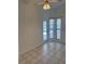 Bright room featuring tiled floors and sliding glass doors leading to the pool at 1128 Rum Cay Ct, Punta Gorda, FL 33950