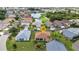 Real estate aerial view of property with manicured lawn and landscaping in a well-planned neighborhood at 1605 Palace Ct, Punta Gorda, FL 33980