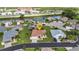 Aerial view of a single-Gathering home featuring well-manicured landscaping and a convenient two-car garage at 1605 Palace Ct, Punta Gorda, FL 33980