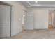 Bedroom with gray carpet, large doors and trim, neutral paint and recessed lighting at 16848 Canopy Garden Dr, Port Charlotte, FL 33953