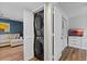 Conveniently located laundry room with stacked washer and dryer, next to the living area at 19505 Quesada Ave # Vv201, Port Charlotte, FL 33948
