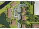 Overhead view of community featuring well-maintained buildings, ample parking, and beautiful landscaping, highlighting its appeal at 19505 Quesada Ave # Vv201, Port Charlotte, FL 33948