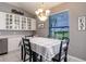 Kitchen dining area with white cabinets, stainless appliances and lovely natural light at 2105 Deborah Dr, Punta Gorda, FL 33950