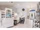 Bright living room with high ceilings, tile flooring, and a decorative entryway at 2105 Deborah Dr, Punta Gorda, FL 33950