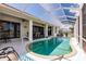 Relaxing screened-in pool area with plenty of space for outdoor seating at 2105 Deborah Dr, Punta Gorda, FL 33950