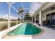 Inviting screened-in pool area with a scenic view at 2105 Deborah Dr, Punta Gorda, FL 33950