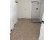 Bathroom area with tile flooring and tiled shower with modern fixtures at 214 W Grace St, Punta Gorda, FL 33950