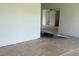 Bright and airy living room featuring neutral walls and flooring, ready for your creative design at 214 W Grace St, Punta Gorda, FL 33950