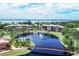 View of the pond, foot bridge and fountain that enhance this community and create a relaxing atmosphere for its residents at 23465 Harborview Rd # 214, Punta Gorda, FL 33980