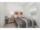 Charming bedroom with a cozy bed, plush toys, and ample natural light at 24348 Nicobar Ln, Punta Gorda, FL 33955