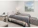 Inviting bedroom with a comfy bed, neutral decor, and a peaceful ambiance at 24348 Nicobar Ln, Punta Gorda, FL 33955