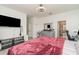 Spacious bedroom with a modern aesthetic, ample natural light, and clean white walls at 24348 Nicobar Ln, Punta Gorda, FL 33955