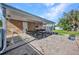 Outdoor patio with comfortable seating, ideal for entertaining and relaxation at 25082 Harborview Rd, Punta Gorda, FL 33980