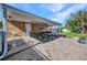 Outdoor patio with comfortable seating, ideal for entertaining and relaxation at 25082 Harborview Rd, Punta Gorda, FL 33980